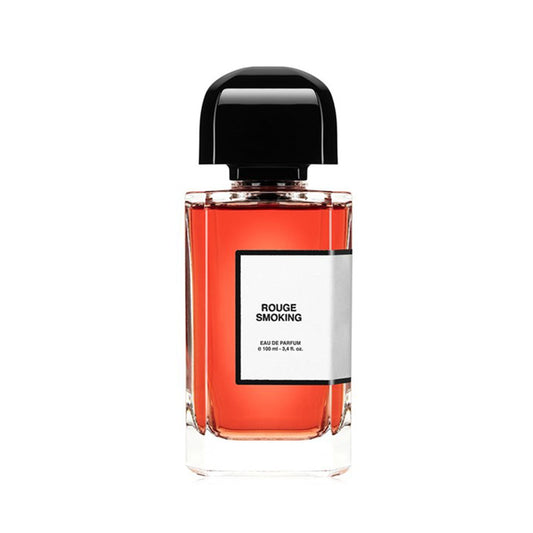 Bottle of Rouge Smoking Eau de Parfum with black cap and clear label on white background.